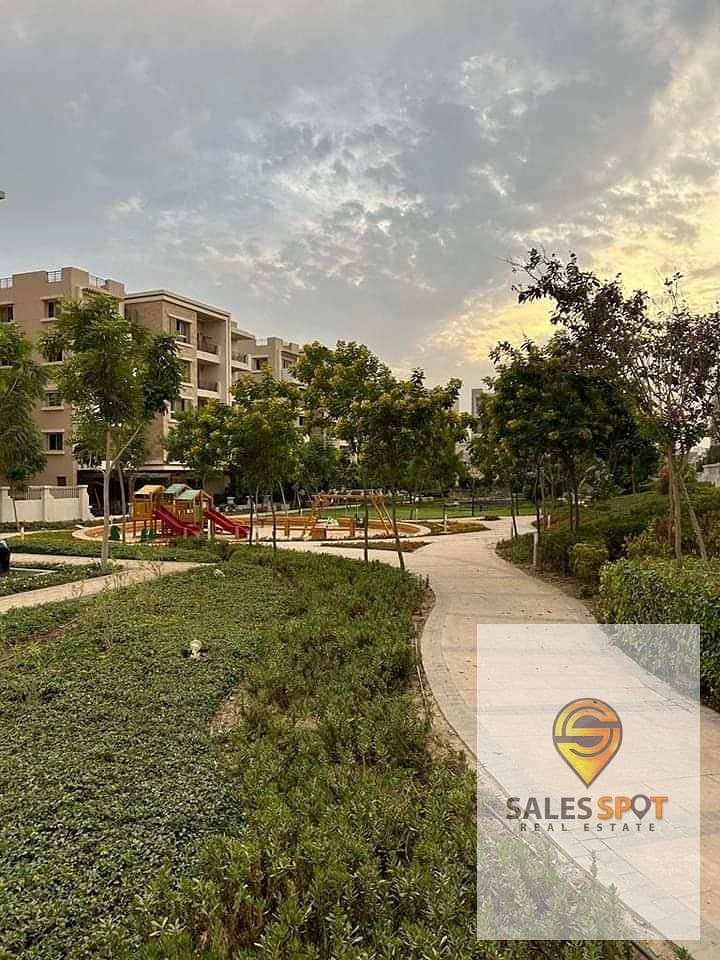  With a 42% discount, a 144 sqm apartment with a private garden for sale in Sarai Compound \\ next to Madinaty and in front of Shorouk City 7