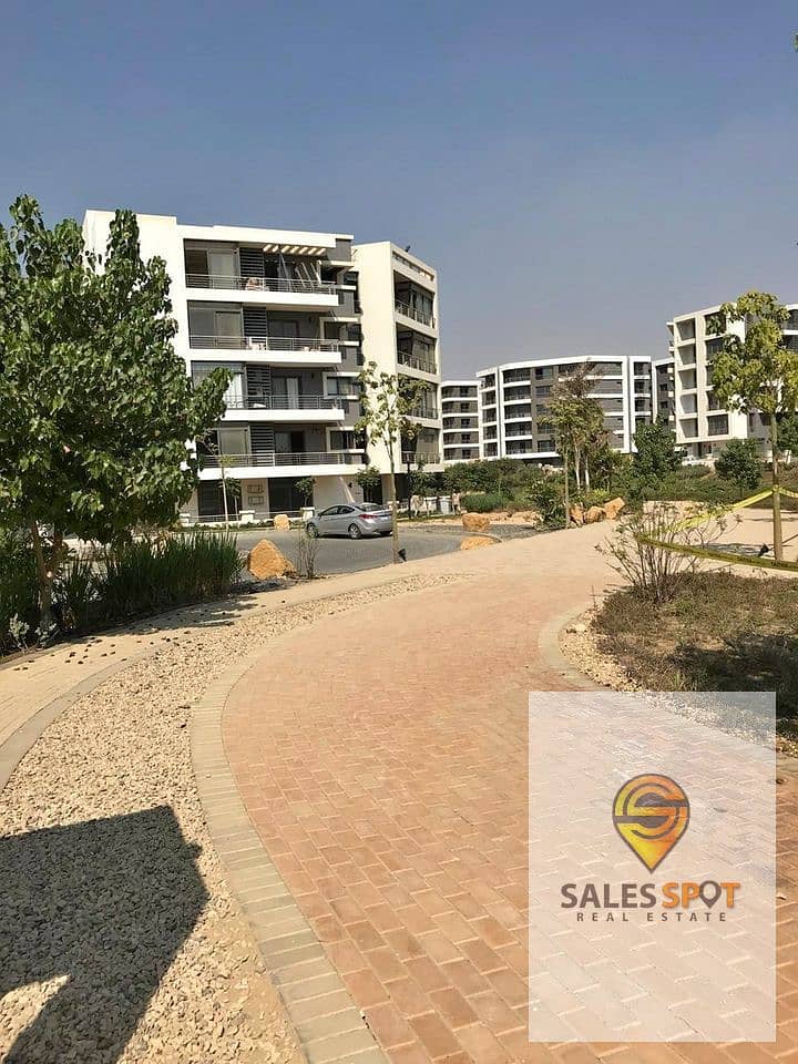 With a 42% discount, 115 sqm apartment + garden for sale in Taj City Compound in the First Settlement, directly in front of the airport 14