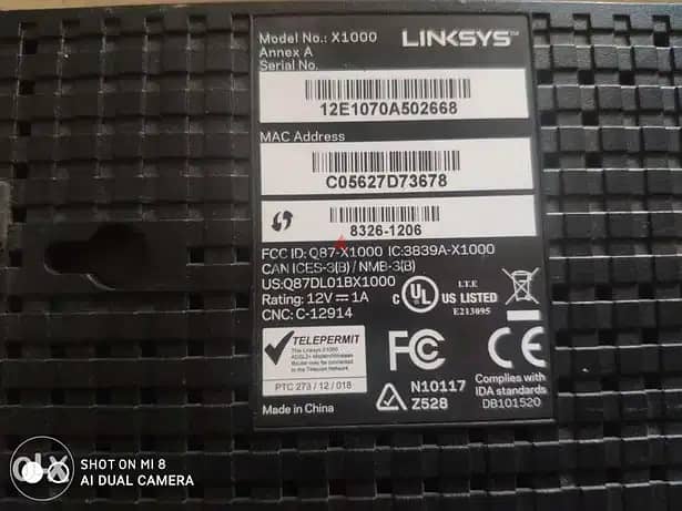 روتر Linksys x1000 بحالة ممتازة و الأدبتور الأصلي 2