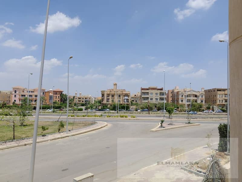 Ground-floor apartment with a garden for sale in a villa, just steps away from the Dahshur connector, on the main street in Sheikh Zayed, Al Bustan St 4