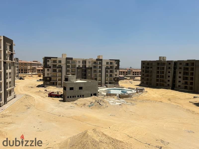 80 meters furnished Apartment with a big roof  in bliss gate compound in shaikh zayed city with a 50% discount beside hyper one 5