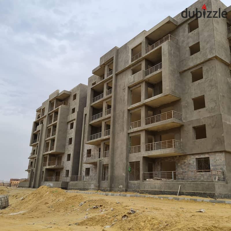 80 meters furnished Apartment with a big roof  in bliss gate compound in shaikh zayed city with a 50% discount beside hyper one 2