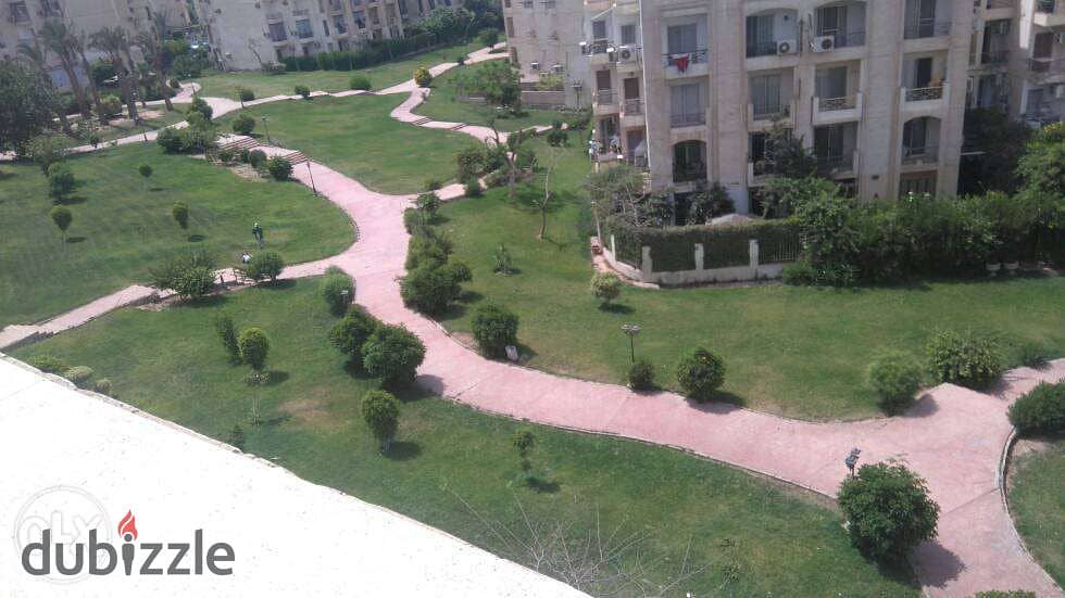 for sale townhouse corner hadayek el mohndsen compound prime location inside the compound 5