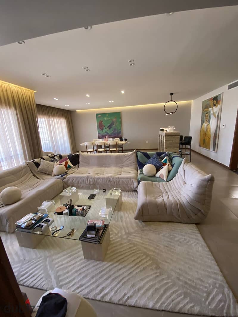 Apartment for sale in New Giza Compound, Sheikh Zayed View, distinguished by kitchen and air conditioning 12