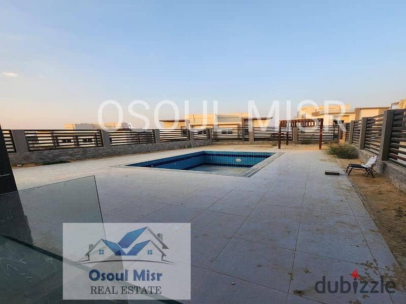 Twin house for sale in Al Khamael, semi-finished, with swimming pool 19