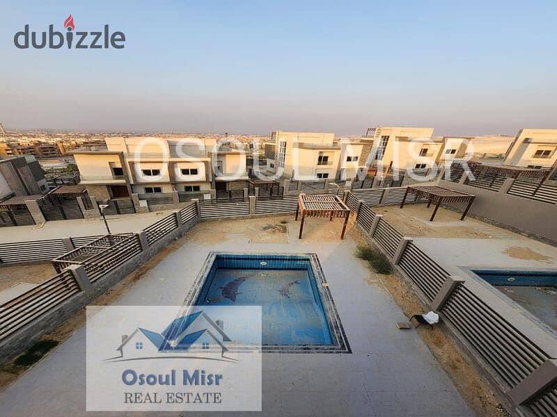 Twin house for sale in Al Khamael, semi-finished, with swimming pool 25