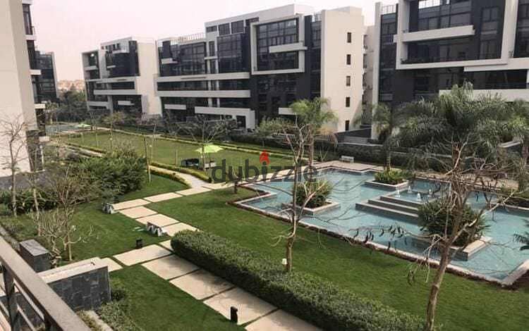 Apartment for sale in Creek Town Compound, New Cairo, with a very distinctive view of the landscape, minutes from Swan Lake 5