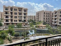 Half price apartment for sale, area 156 m, 3 rooms, landscape view, in Taj City Compound, on Suez Road, in front of Cairo International Airport