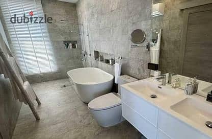 Fully finished hotel apartment for sale on Mohamed Naguib Axis in Jazzy Marriott Residence 9