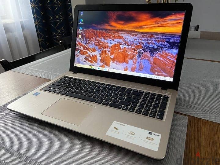 بالكرتونة  زيرو لاب توب ASUS يعمل بصورة ممتازة 0