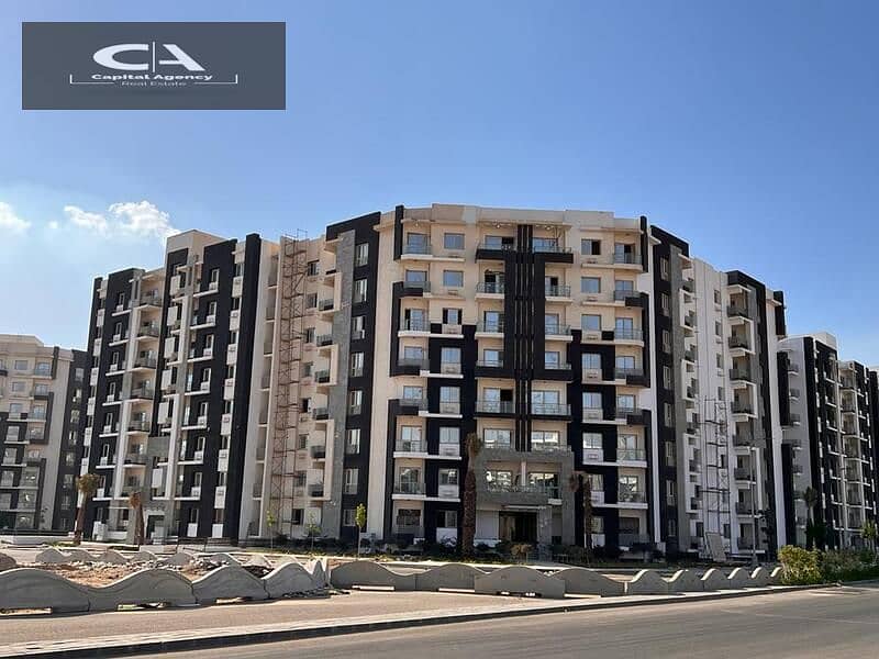 apartment for sale in the capital, in Al-Maqsad Compound, next to the Green River and in front of the iconic tower Only 5% down payment Prime 12