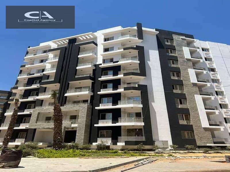 apartment for sale in the capital, in Al-Maqsad Compound, next to the Green River and in front of the iconic tower Only 5% down payment Prime 15