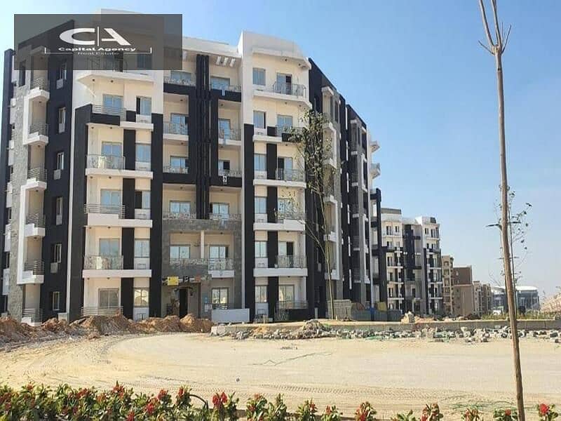 apartment for sale in the capital, in Al-Maqsad Compound, next to the Green River and in front of the iconic tower Only 5% down payment Prime 16