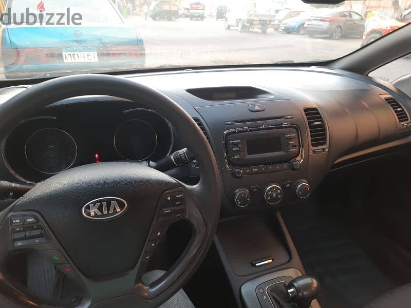 Kia Cerato 2013 بحاله ممتازه 1