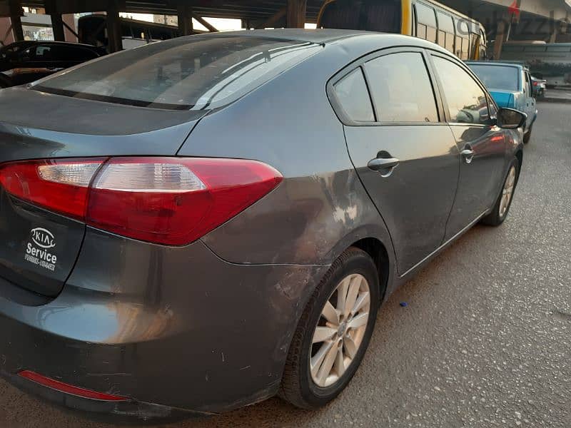 Kia Cerato 2013 بحاله ممتازه 4