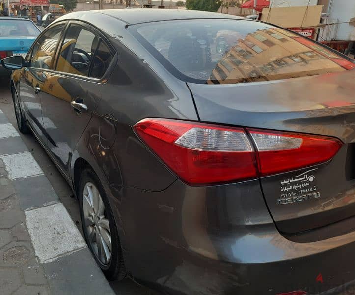 Kia Cerato 2013 بحاله ممتازه 5