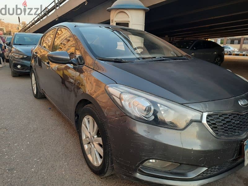 Kia Cerato 2013 بحاله ممتازه 7