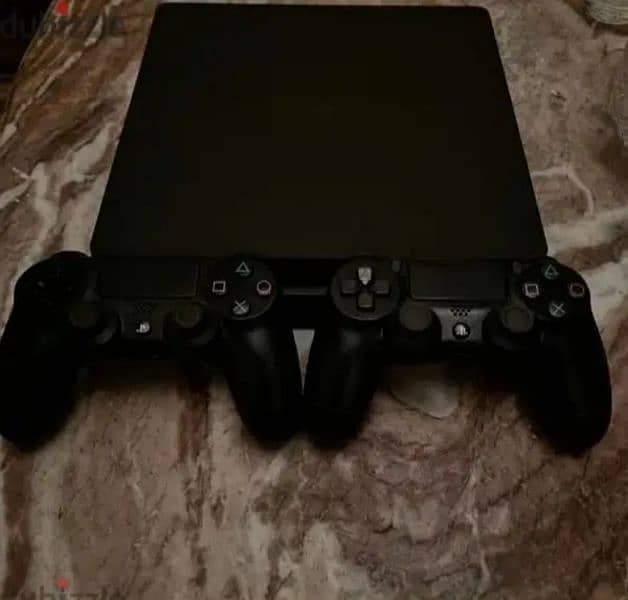 ps4 slim 1TB with box and two controller and original cables 2