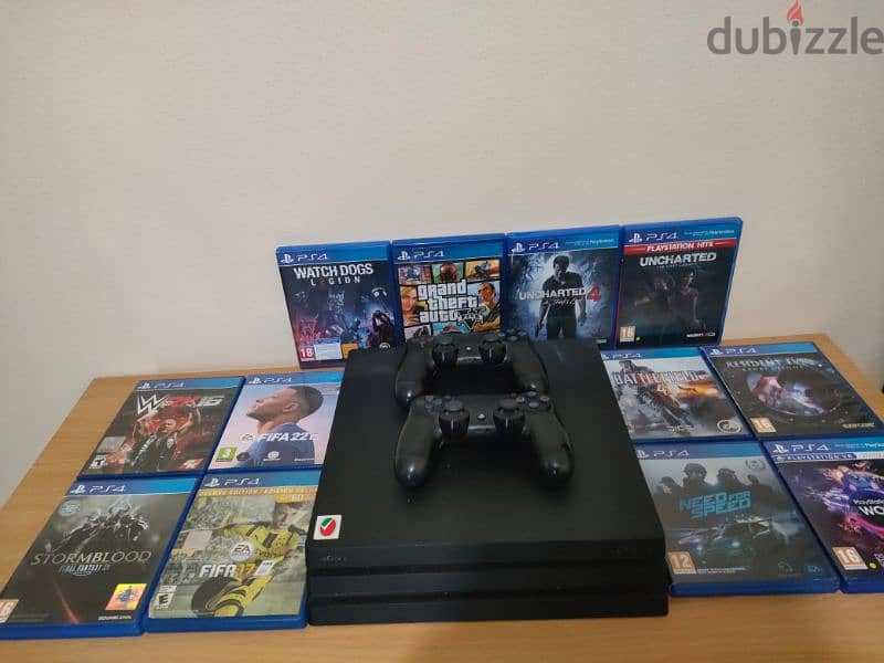 PS4 إماراتي pro 1TB with library of games  ومعاه دراعين 2