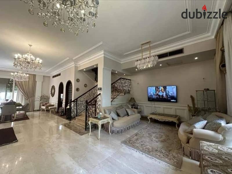 The largest stand alone villa for sale, immediate receipt in the compound of entire villas in the heart of Taj City in front of Cairo Airport 4