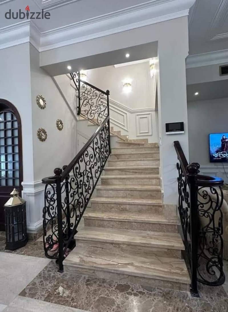 The largest stand alone villa for sale, immediate receipt in the compound of entire villas in the heart of Taj City in front of Cairo Airport 5