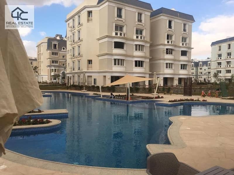 Corner apartment for sale bahary 140 sqm on the first floor in the best location, in Mountain View iCity Compound, New Cairo. 1