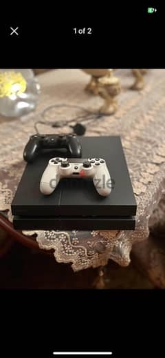 Ps4 1 Tb (V2 Physical Buttons) 2 controllers in a good condition 0