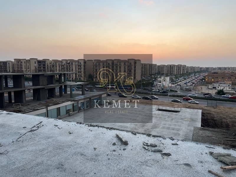 COMMERCIAL GROUND  FOR SALE 346.5 SQ M YOUSIF ELSIBAIE DIRICT FRONT OF 23 ELREHAB GATE WITH REVENUE FIRST YEAR 9980000 NEW CAIRO 8