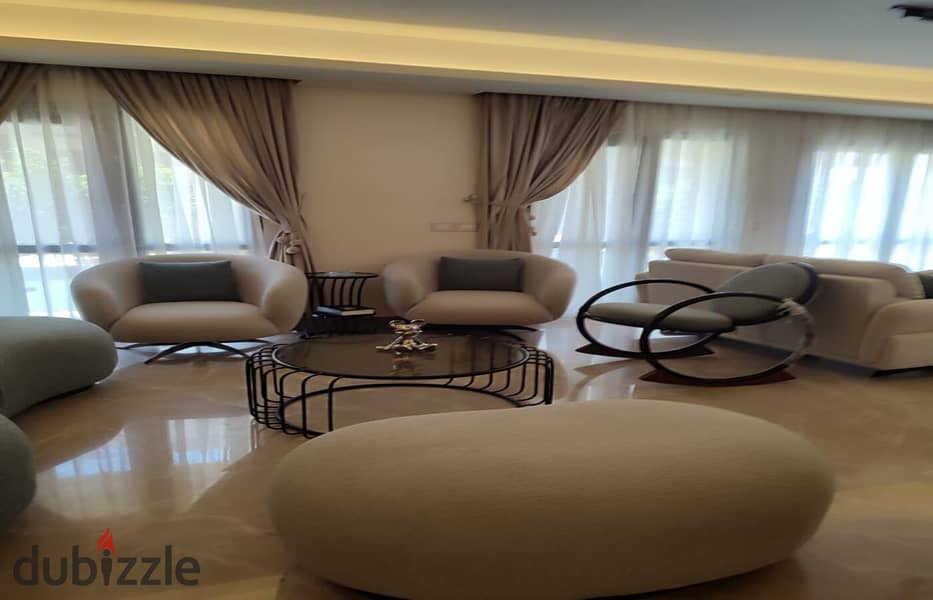 Luxurious fully furnished apartment with garden for rent in Eastown Sodic compound new Cairo fifth settlement 2