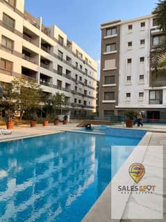 For sale in Taj City, an apartment with a private garden in an excellent location inside the compound, close to the facilities