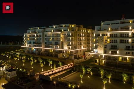 apartment redy to move for sale  in Mountain View iCity New Cairo in installments distinctive apartment on the landscape and lagoon