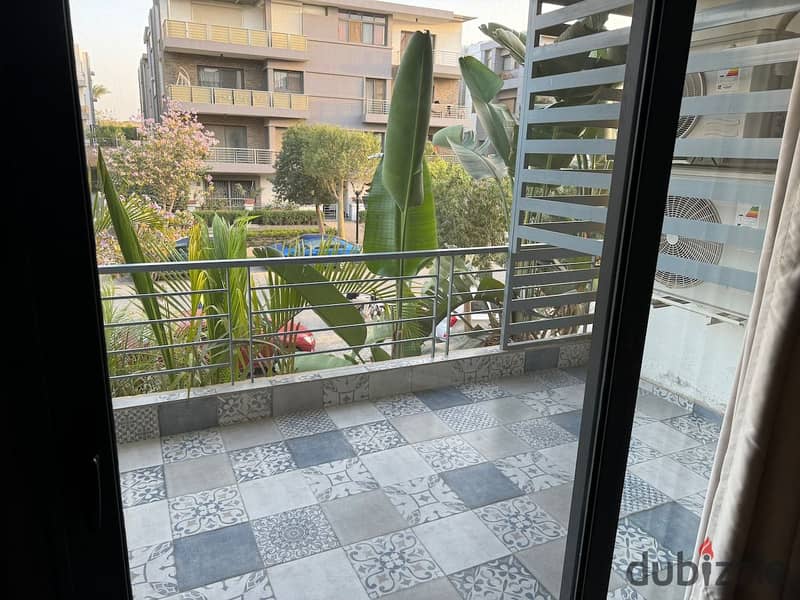 155 meters in front of the airport, two steps from Nasr City, apartment for sale inside Taj City Compound, the best location due to its location on th 1