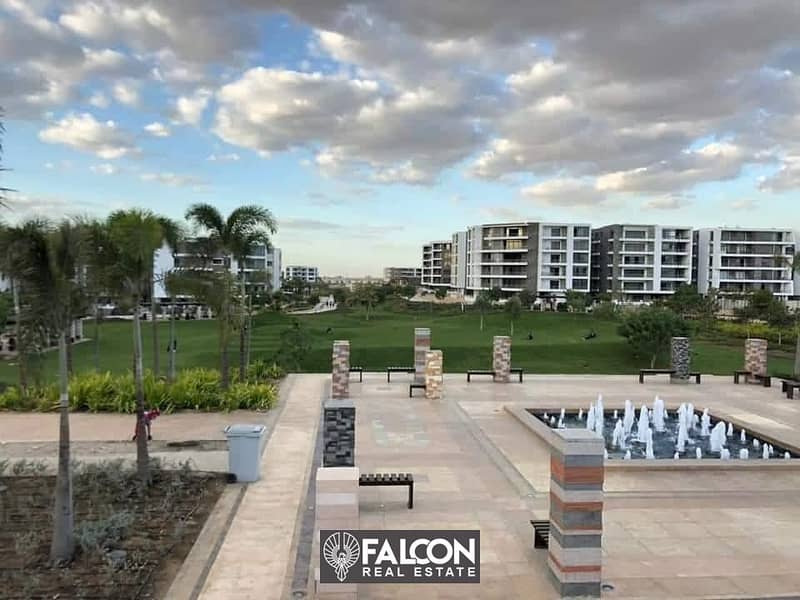 Apartment for sale with an open view of the golf course in front of Cairo Airport and JW Marriott with a 42% discount in Taj City 2