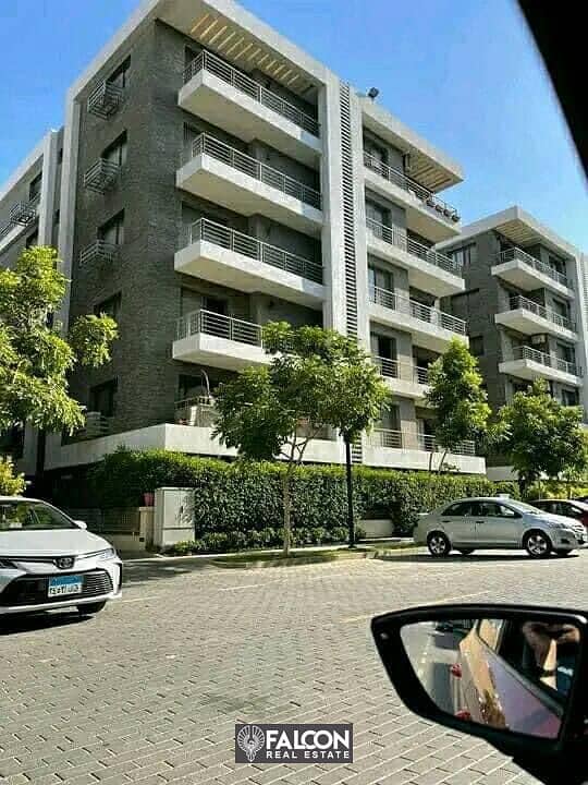 Apartment for sale with an open view of the golf course in front of Cairo Airport and JW Marriott with a 42% discount in Taj City 9