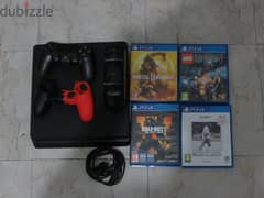 PS4 Slim 1TB with one controller,cover,4 Games and a charging station