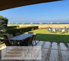 Chalet for sale, 125 square meters + private garden, with a down payment of (1.2 million) in Telal Al Sokhna village, 5 minutes away from Porto