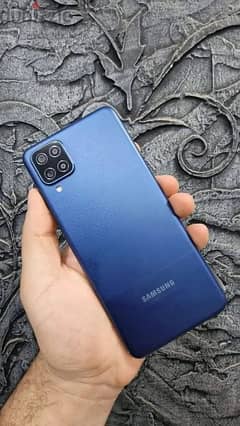 Samsung A12 4GB Ram, 128 GB.