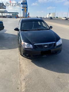 Kia Cerato 2005 فبريكا برا و جوا 0