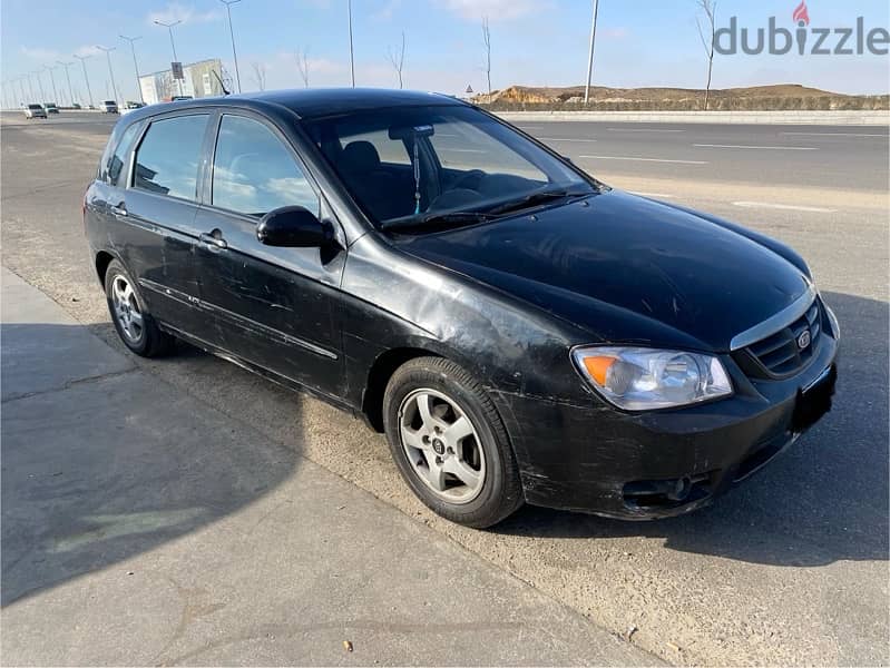 Kia Cerato 2005 فبريكا برا و جوا 1