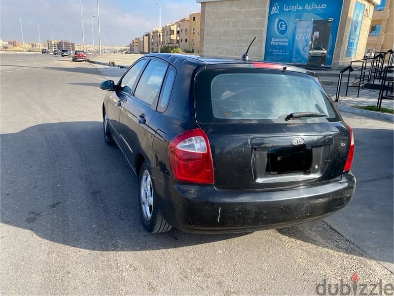 Kia Cerato 2005 فبريكا برا و جوا 3