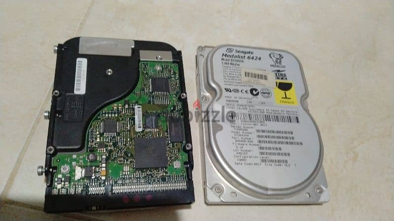 هارد Seagate 6.448Mbytes ومازرز بورد molex 0