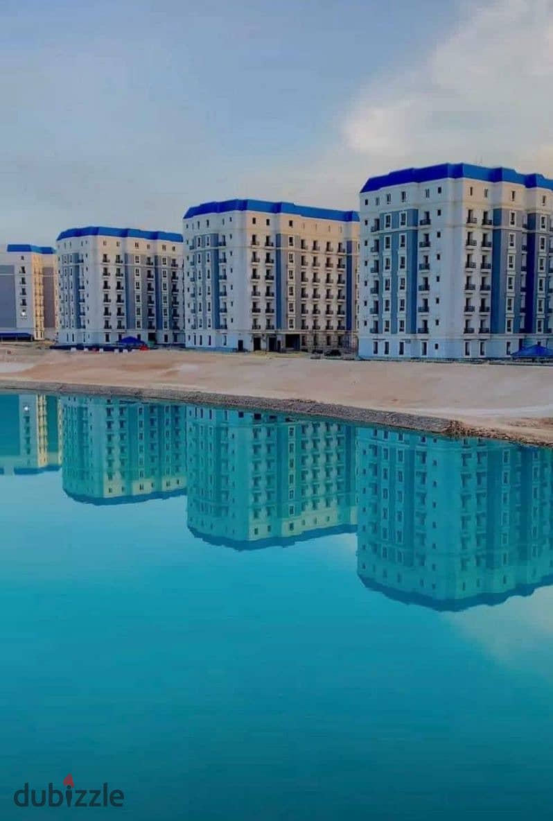 Own a fully finished apartment once you pay your deposit with a panoramic view in the Latin Quarter in North Coast, minutes from Downtown New Alamein. 0