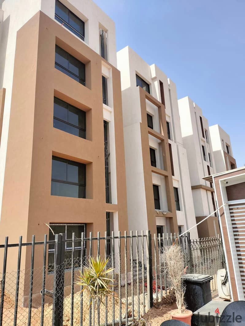 Apartment with a garden for sale with a distinctive view, in installments without interest, with a down payment of 344 thousand, the fastest delivery 9