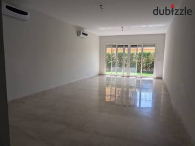 luxurious ground floor apartment with garden for rent in mivida emaar - new cairo near to the auc