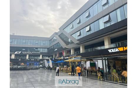 Shop for sale, immediate receipt, ground floor in The Gate Plaza Mall, area of ​​135 meters, with an outdoor area of ​​50 meters