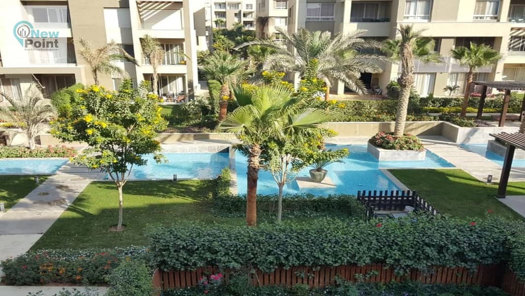 Apartment with garden for sale in Swanlake Hassan Allam Compound in the heart of the first settlement, directly in front of Rehab 0