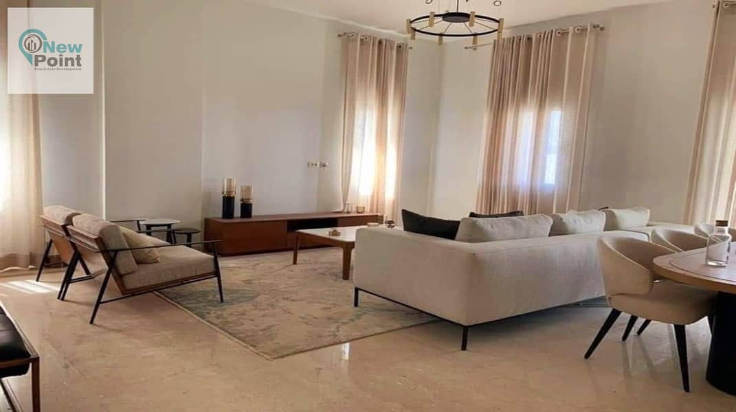 Own with Hassan Allam a finished apartment in a compound with integrated services and ready for inspection, Swan Lake Compound, directly in front of R 9