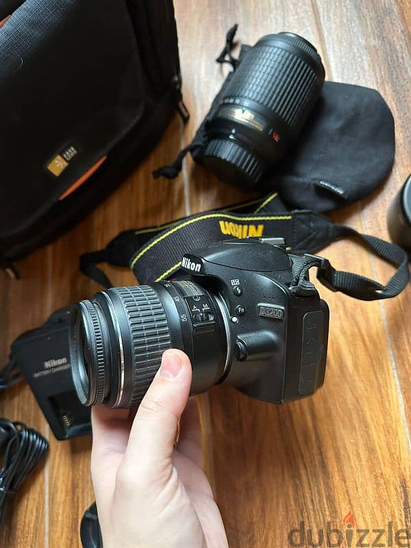 Nikon D3200 حالتها كالجديدةlens 18-55
+ 55-200 معها شاحن/بطارية/شنطة 1