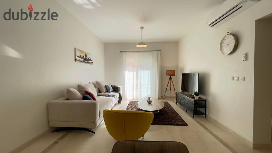 furnished apartment in mivida - boulevard 0