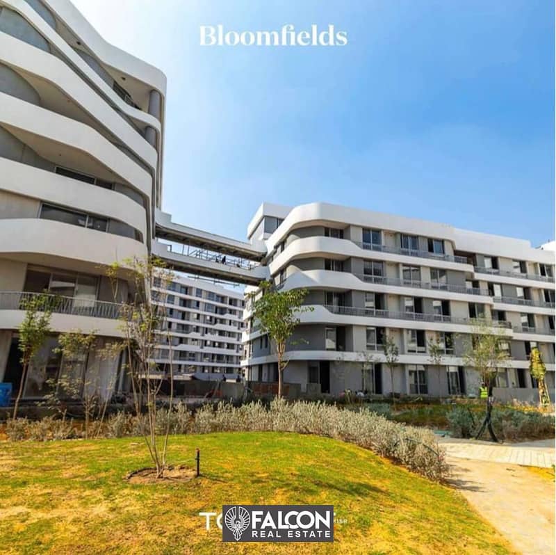 شقة دور ارضى بحديقة متشطبة بالكامل بالتجمع الخامس بكمبوند بلومفيلدز Bloomfields Compound 13